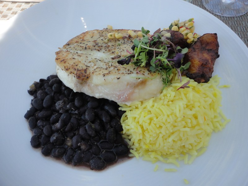 Grilled grouper with saffron rice, black beans, and plantains. Simply delicious.