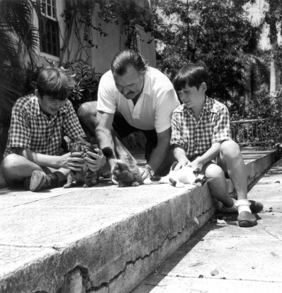 Hemingway in Cuba with Patrick and Gregory and some feline friends