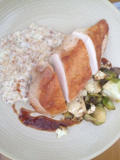 Chicken confit with barley risotto and roasted brussels sprouts. Holla!