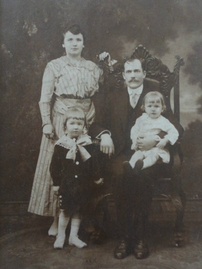 Babcia and Dziadzia Upstairs with her young family. My mom's father is on the left.